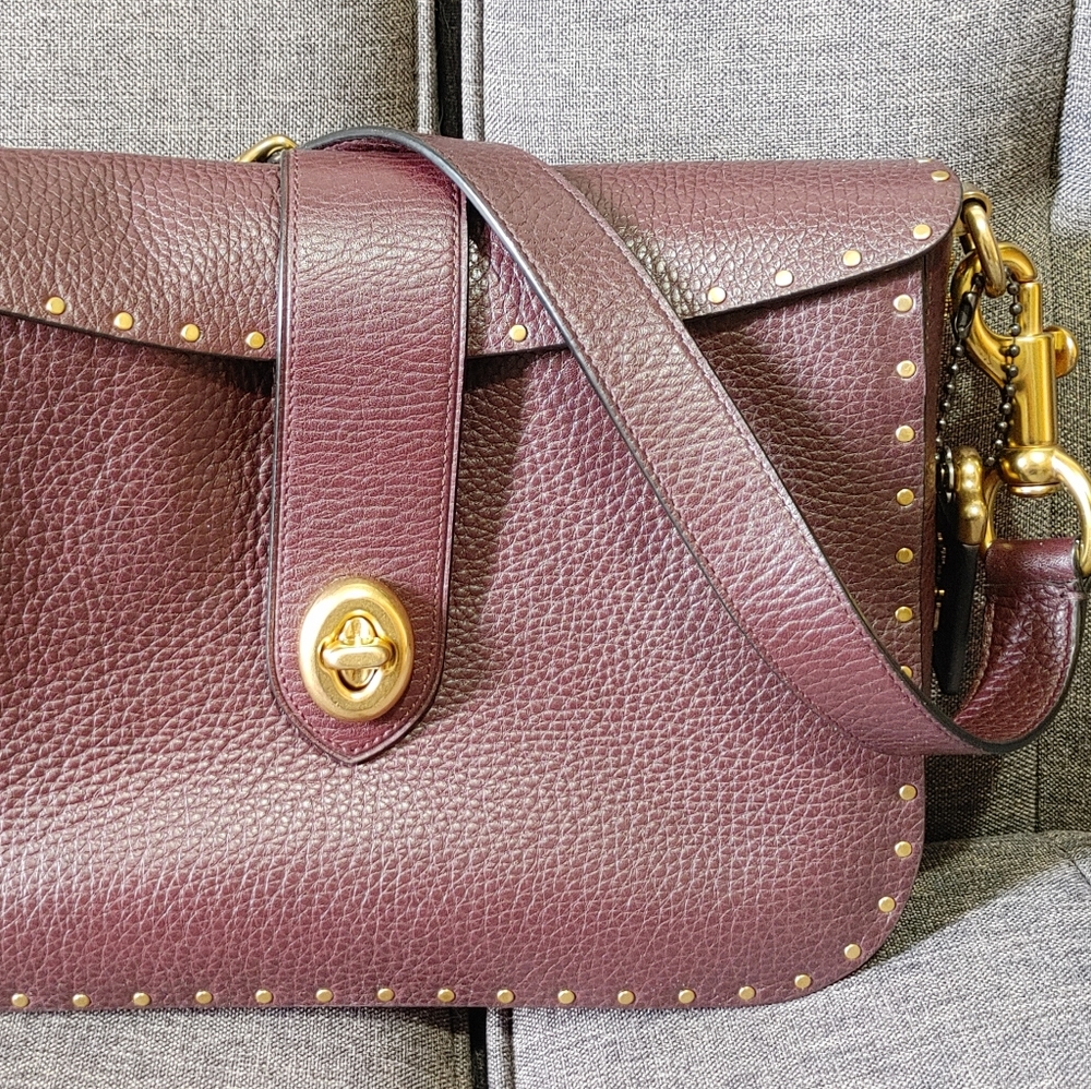 Coach Oxblood Page 27 with Rivets